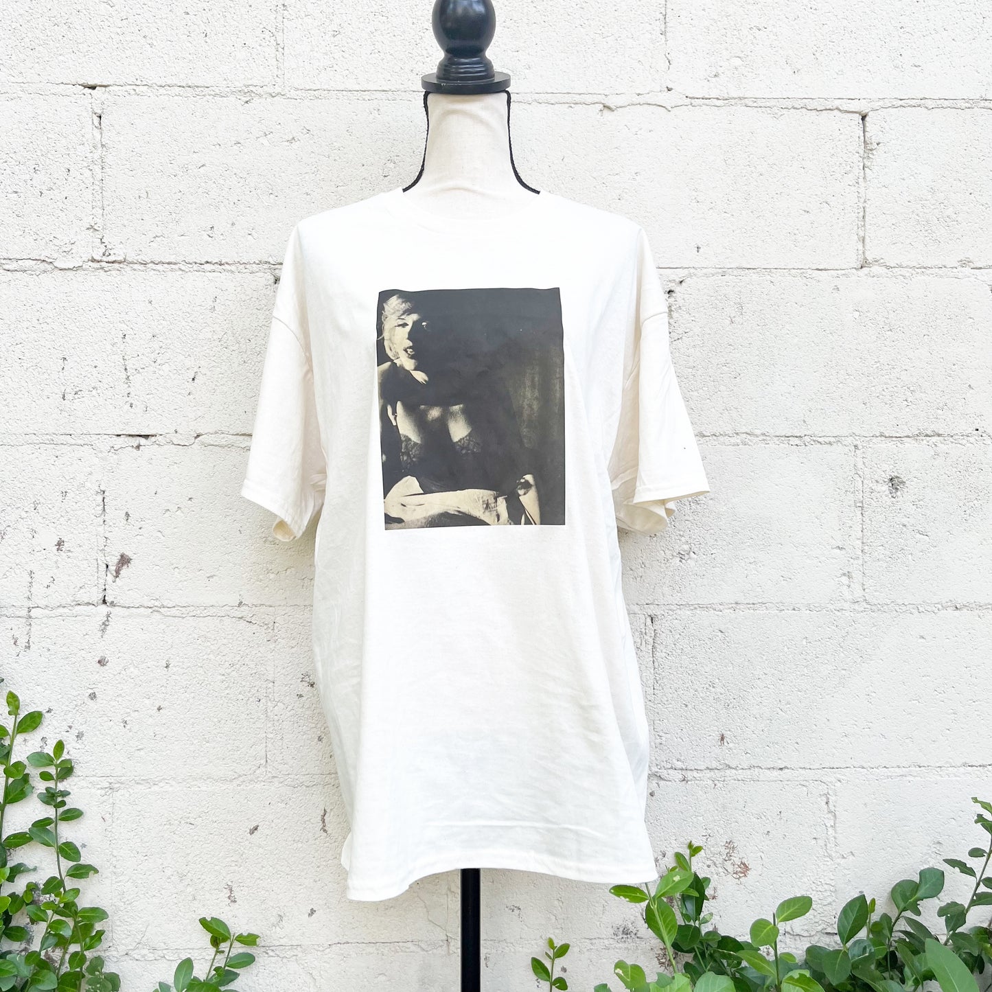 This tee comes in the color Sand hand has a retro feel with handspun freckles built into the product